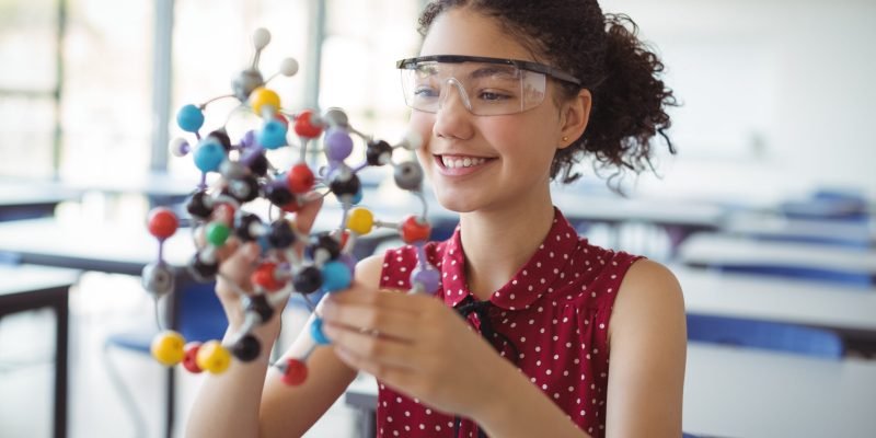 happy-schoolgirl-holding-experimenting-model-in-la-2026-03-26-11-48-11-utc